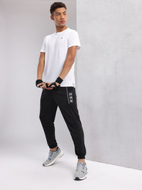 HRX by Hrithik Roshan Men Brand Logo Printed Mid-Rise Rapid-Dry Training Joggers