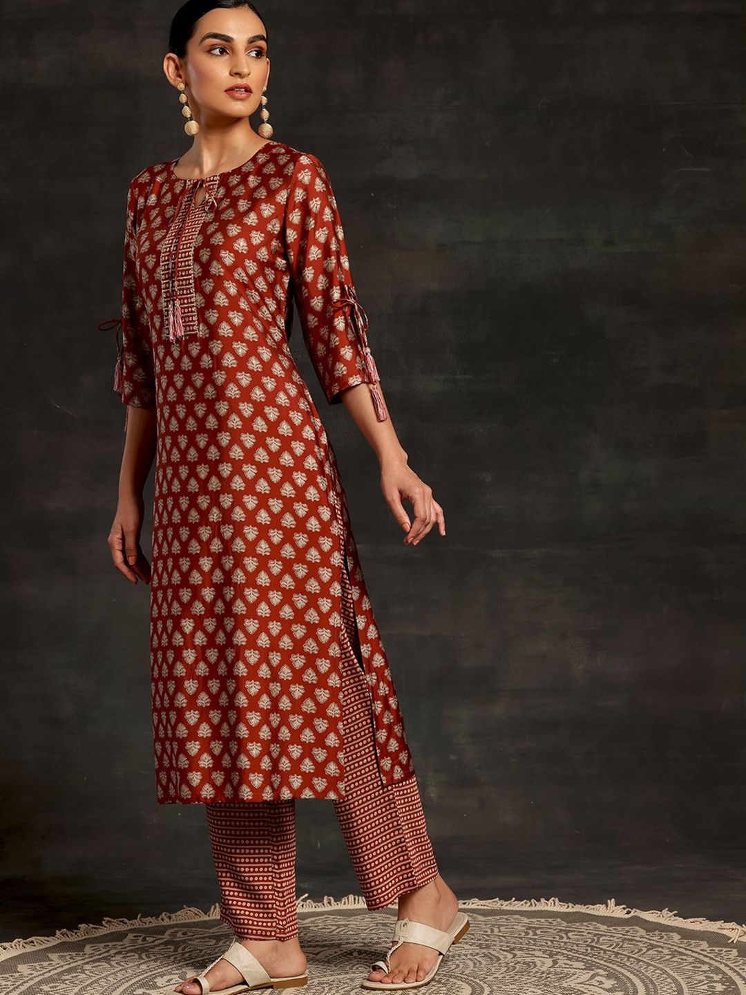 Libas Floral Printed Tie-Up Neck Three-Quarter Sleeves Sequinned Kurta with Trousers