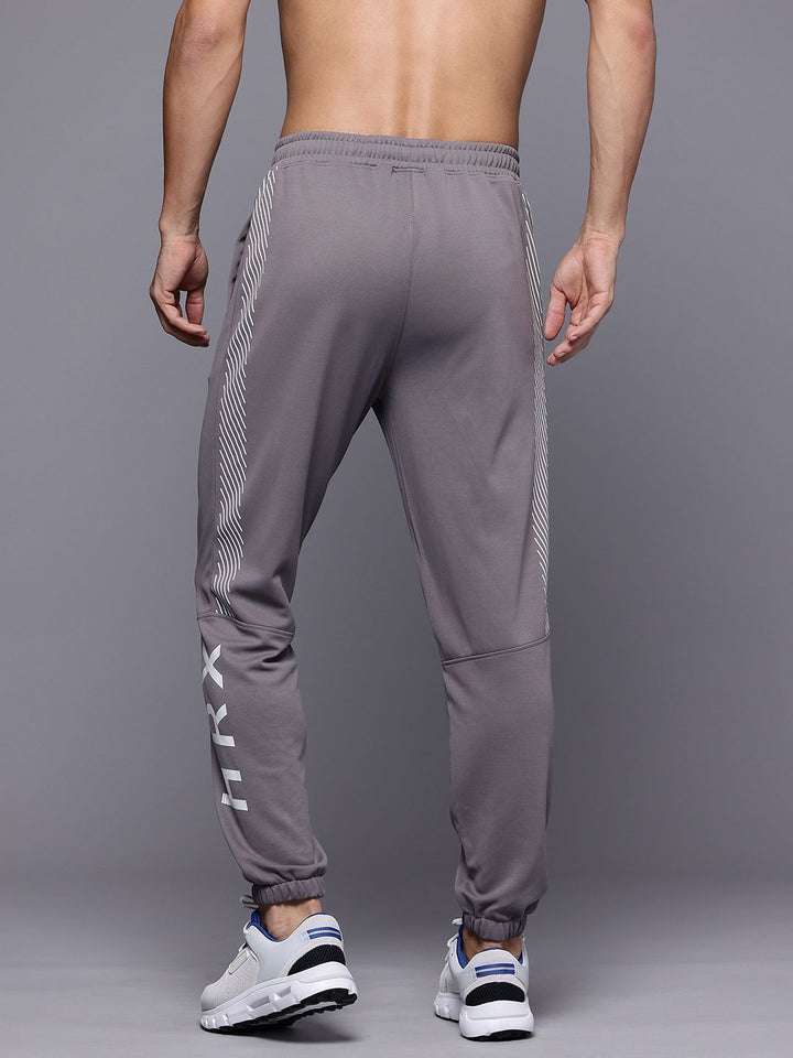 HRX by Hrithik Roshan Men Brand Logo Printed Rapid Dry Training Joggers