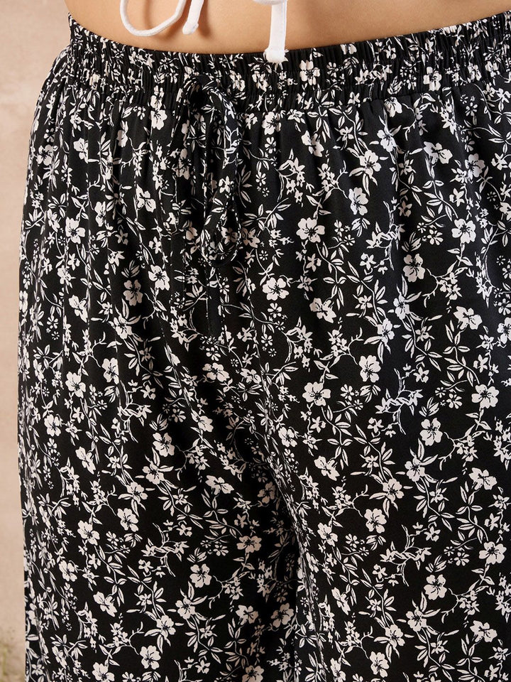 Berrylush Curve Women Black Floral Printed Relaxed High-Rise Parallel Trousers