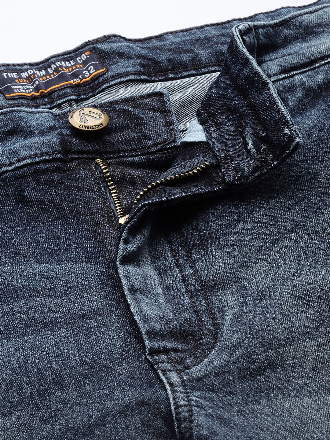 The Indian Garage Co Men Blue Slim Fit Mildly Distressed Light Fade Stretchable Jeans
