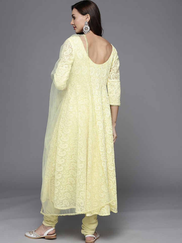 Libas Women Yellow Paisley Embroidered Thread Work Kurta with Churidar & With Dupatta