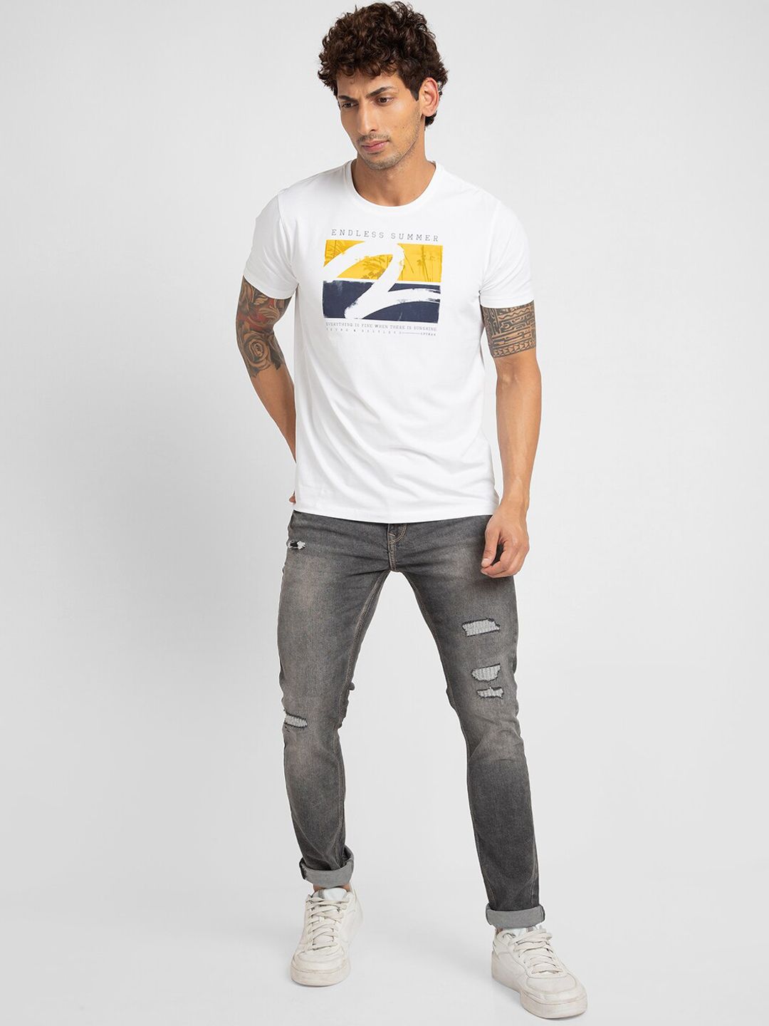 SPYKAR Men Slim Fit Low-Rise Mildly Distressed Heavy Fade Cotton Jeans