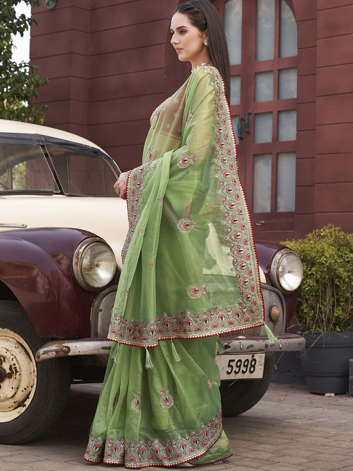 Tikhi Imli Ethnic Motifs Embroidered Net Saree