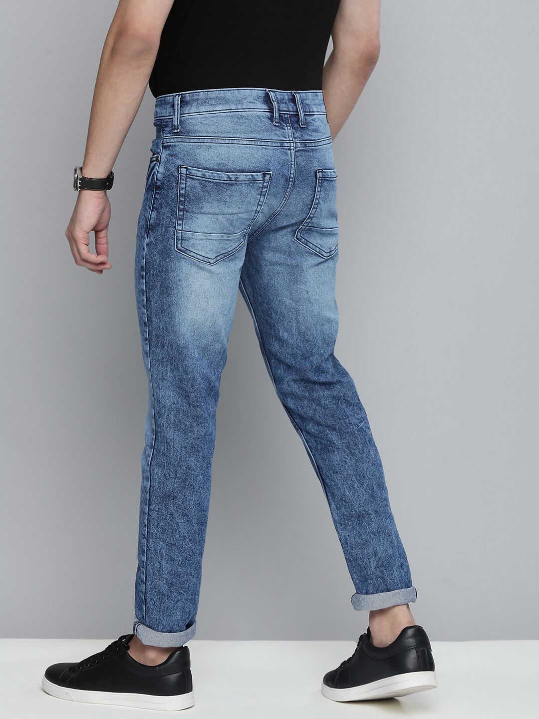 The Indian Garage Co Men Blue Slim Fit Mildly Distressed Light Fade Stretchable Jeans
