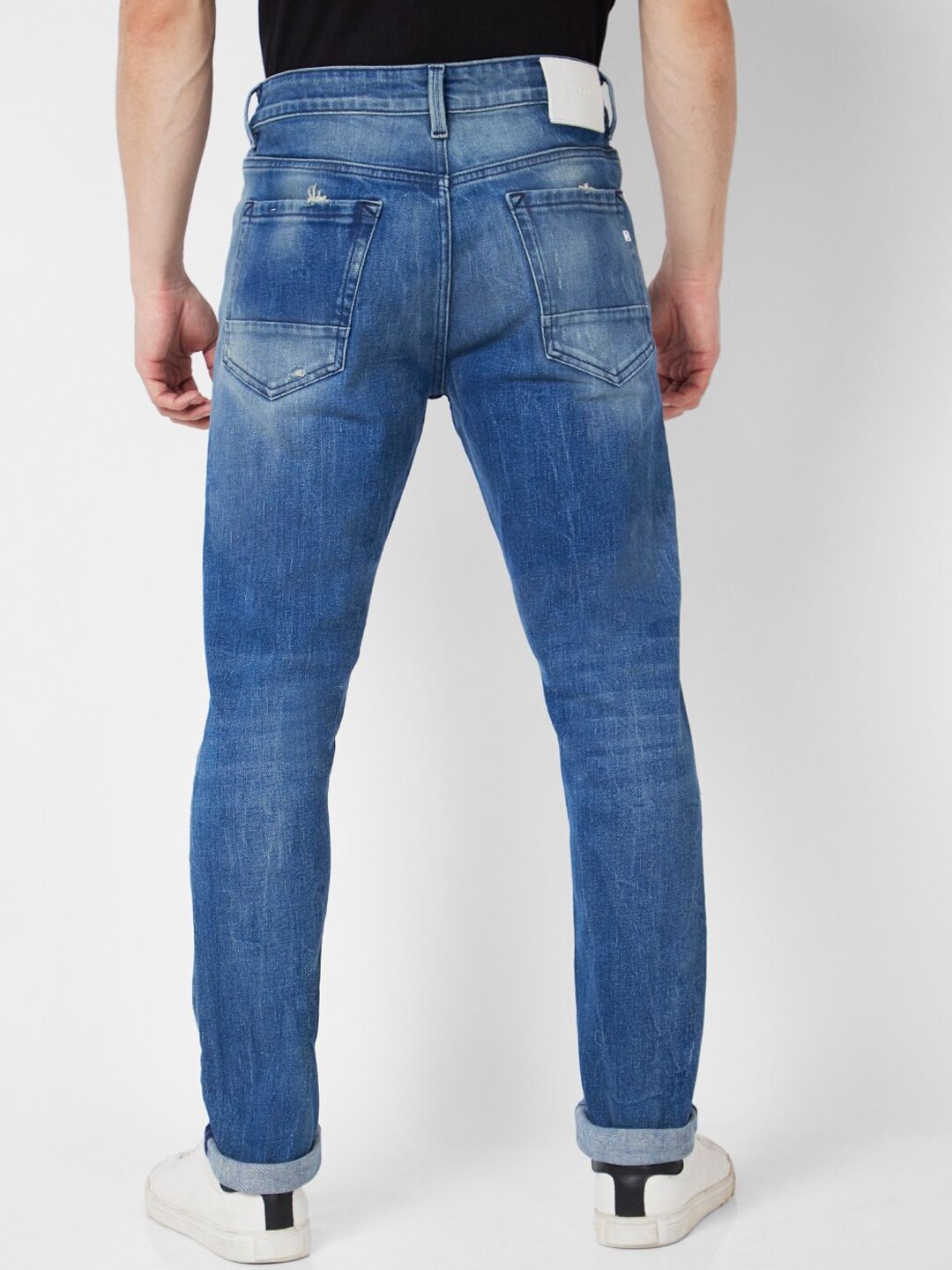 SPYKAR Men Cotton Skinny Fit Low-Rise Mildly Distressed Light Fade Jeans
