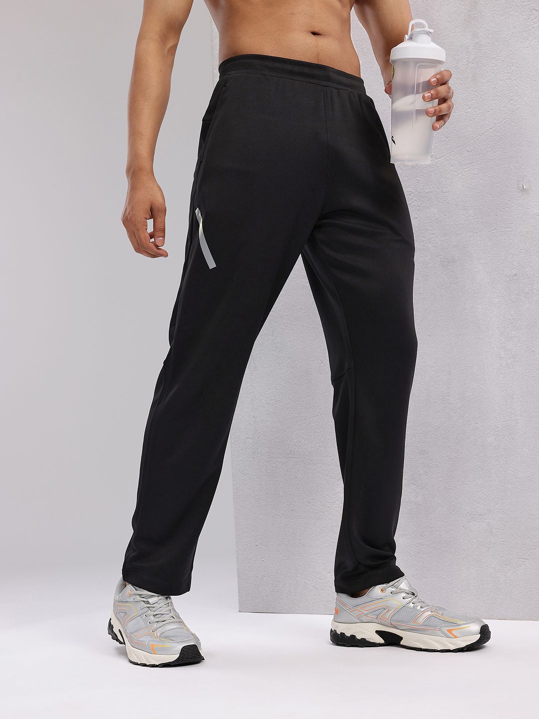 HRX by Hrithik Roshan Men Rapid-Dry Mid-Rise Regular Fit Running Track pants