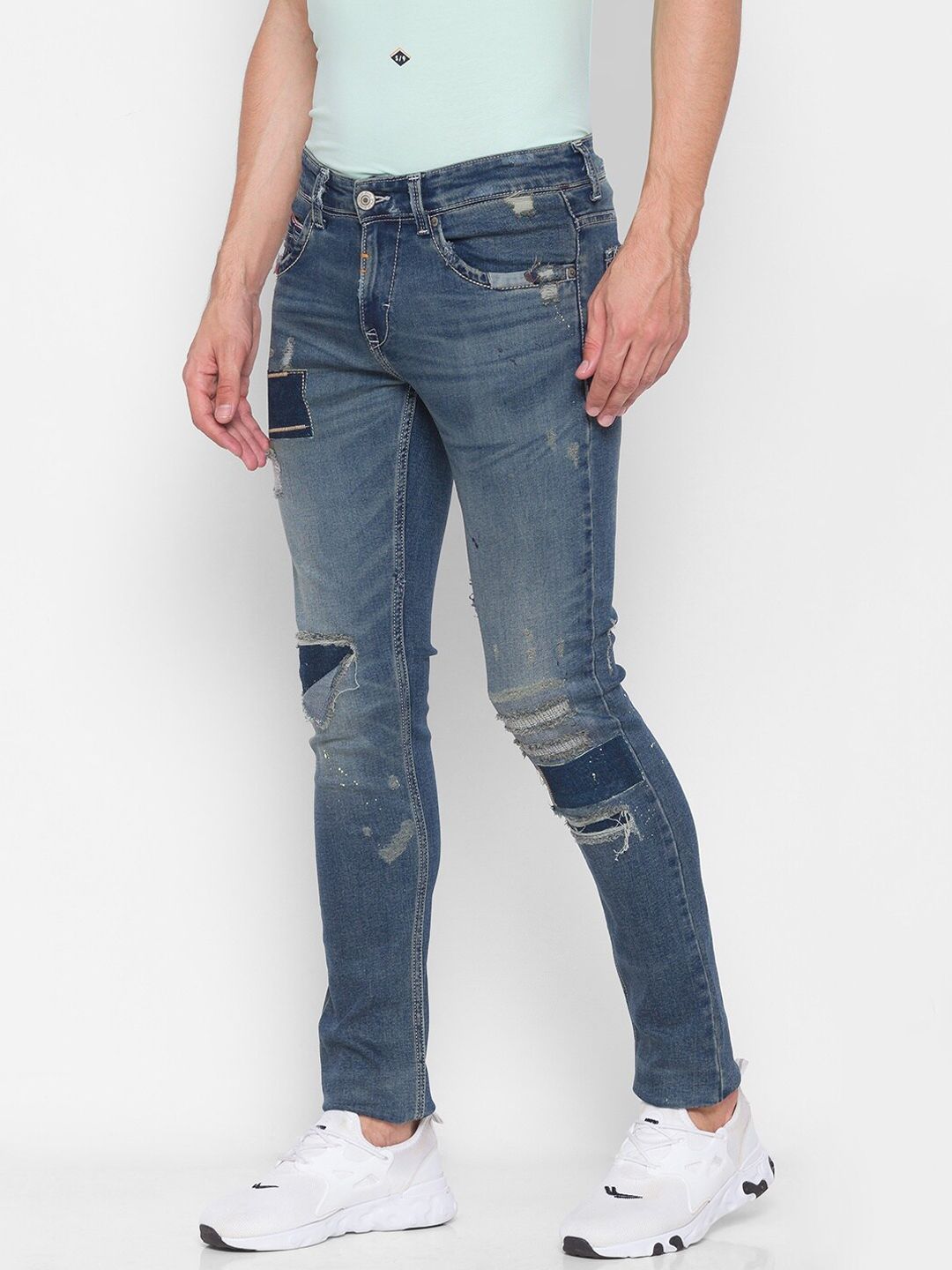 SPYKAR Men Blue Skinny Fit Low-Rise Mildly Distressed Heavy Fade Jeans
