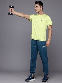 HRX by Hrithik Roshan Men Brand Logo Printed Detail Mid-Rise Rapid-Dry Training Joggers