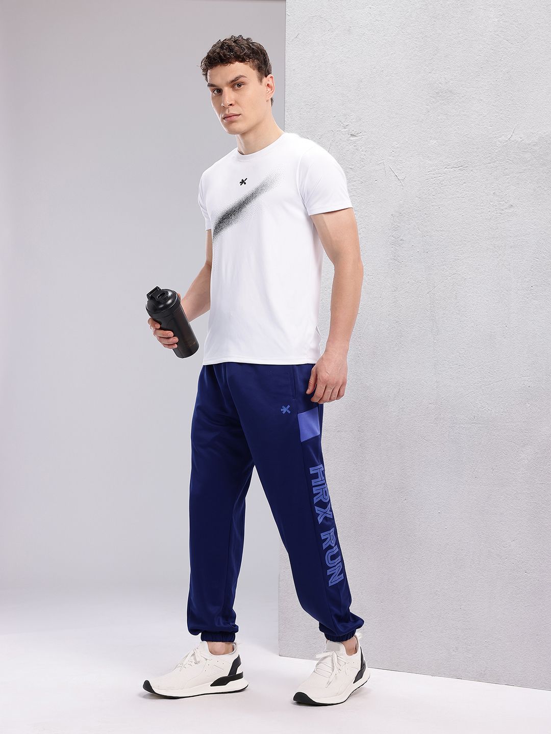 HRX by Hrithik Roshan Men Brand Logo Printed Mid-Rise Rapid-Dry Running Joggers