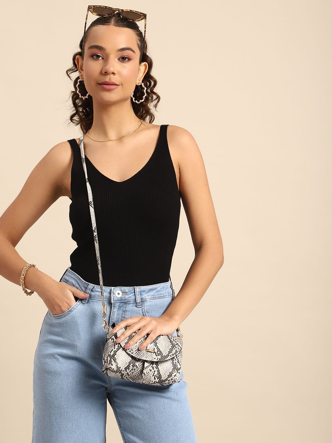 DressBerry Textured Sling Bag