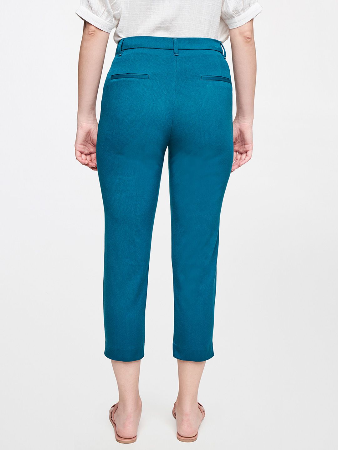 AND Women Teal Solid Casual Tapered Fit Trousers