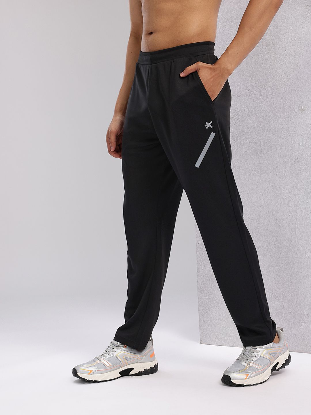 HRX by Hrithik Roshan Men Rapid-Dry Mid-Rise Regular Fit Running Track pants