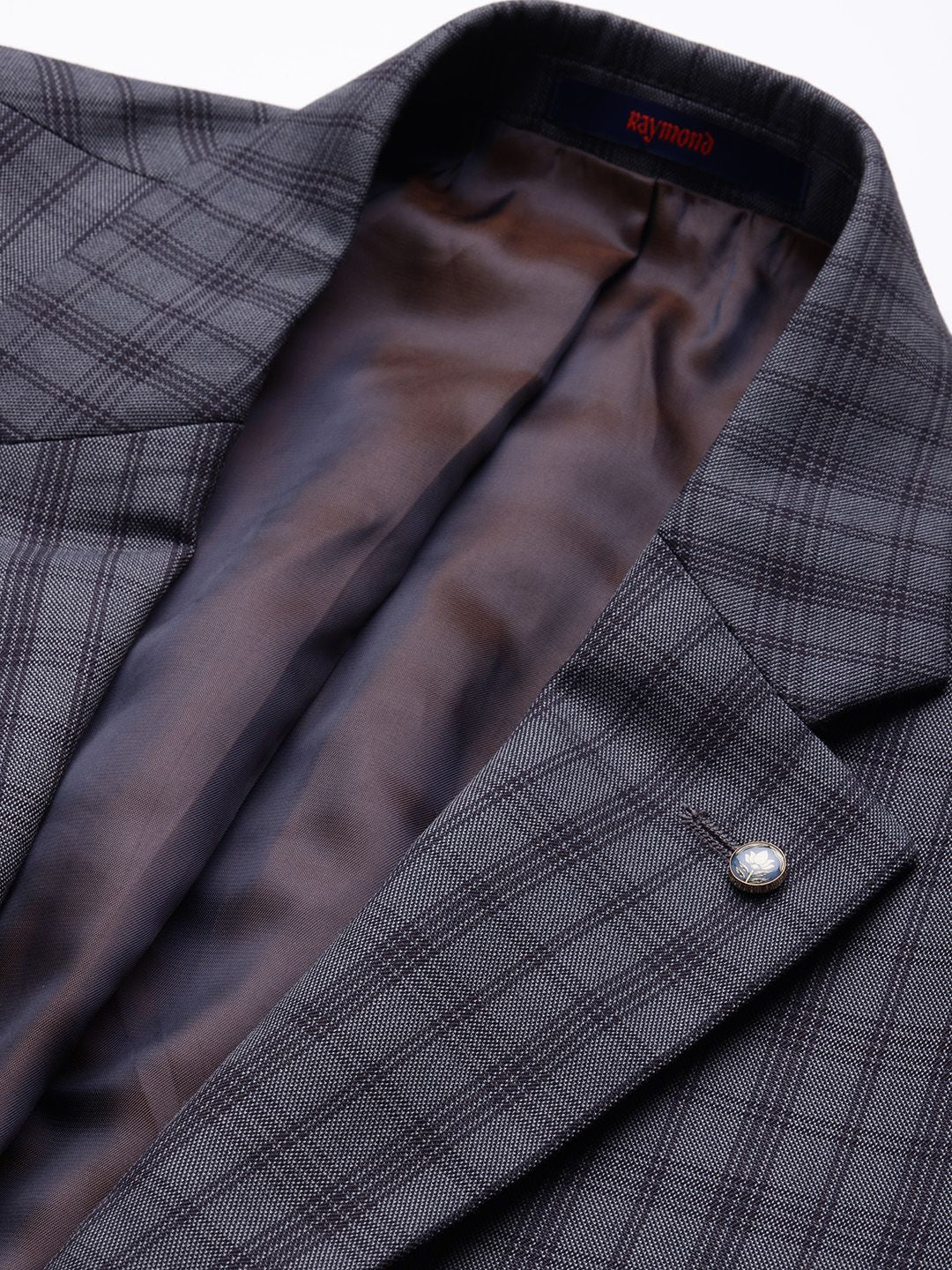 Raymond antibakteria memeriksa blazer rasmi