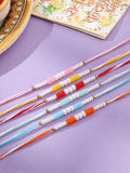 NVR Unisex Set of 6 Multicolor Pearls Thread Rakhi with Roli Chawal, Rakshabandhan Combo