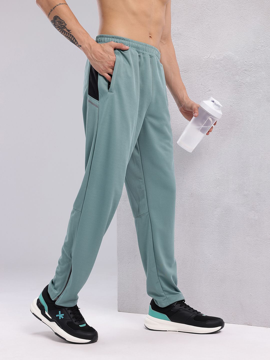 HRX by Hrithik Roshan Men Mid-Rise Rapid-Dry Running Track Pants