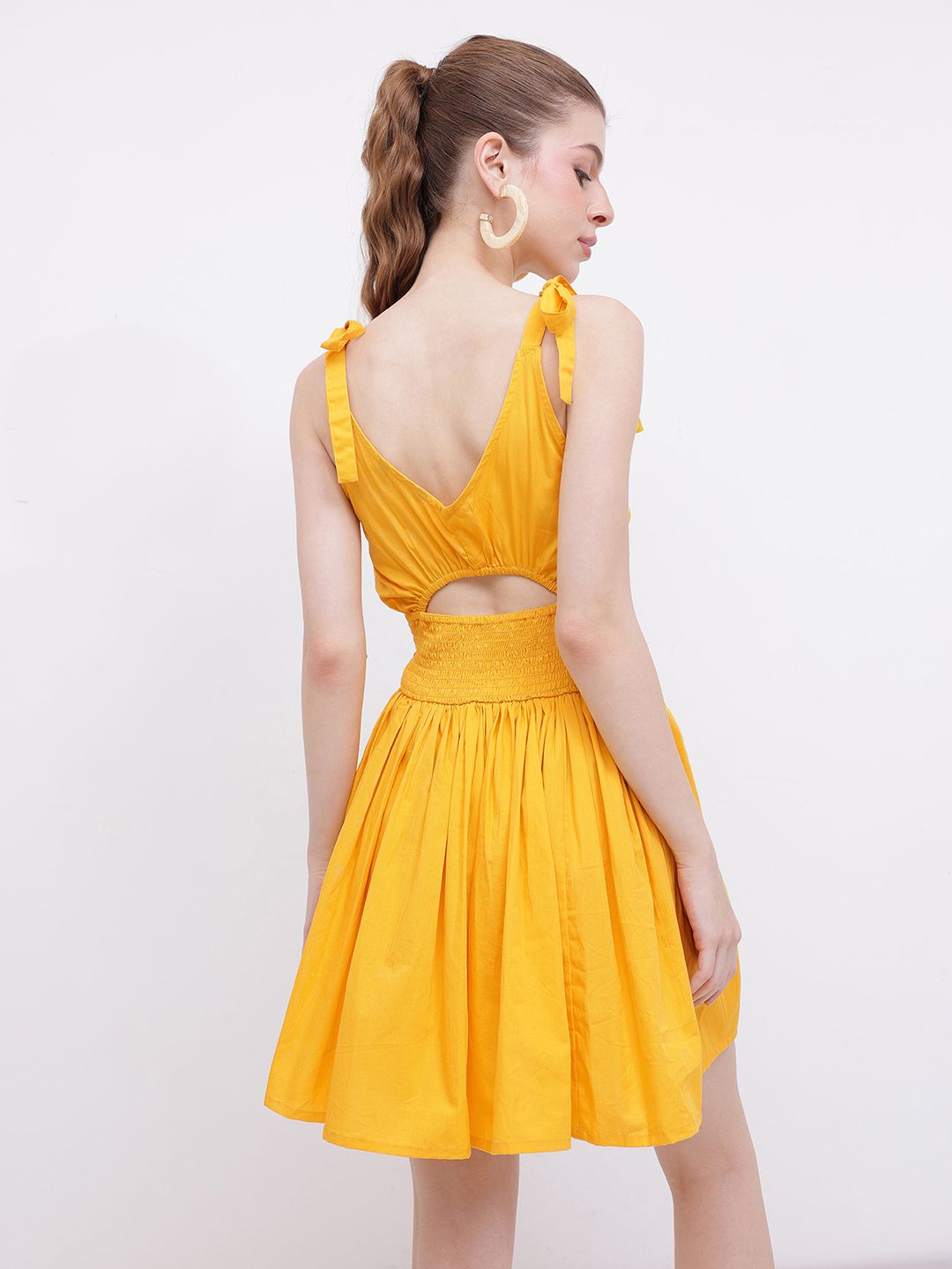 DressBerry Flattering Charm Cinched Smocked Waist Cut-Outs Bow Detailed A-line Mini Dress