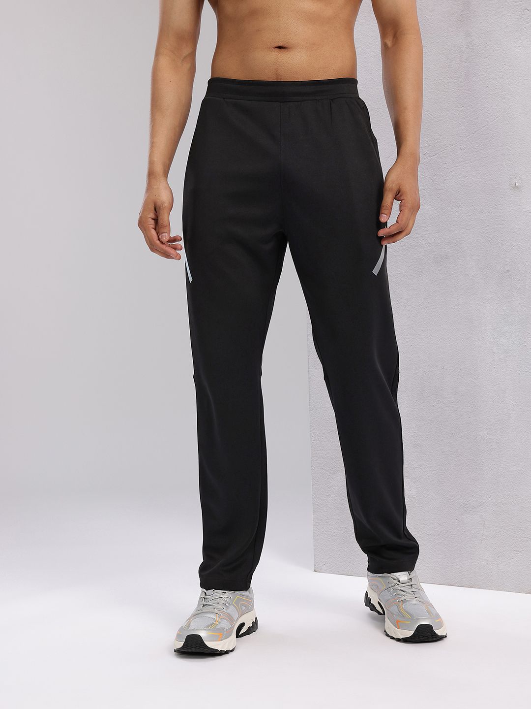 HRX by Hrithik Roshan Men Rapid-Dry Mid-Rise Regular Fit Running Track pants