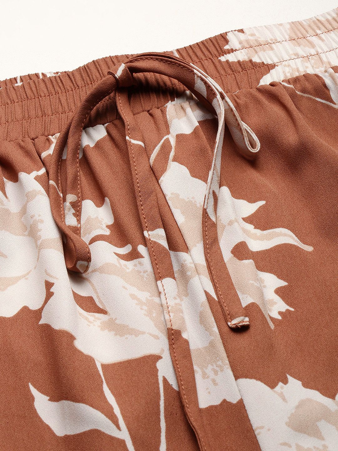 Berrylush Women Brown Floral Printed Relaxed High-Rise Trousers