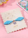 NVR Unisex Blue Pearls Unique  Thread Rakhi With Roli Chawal