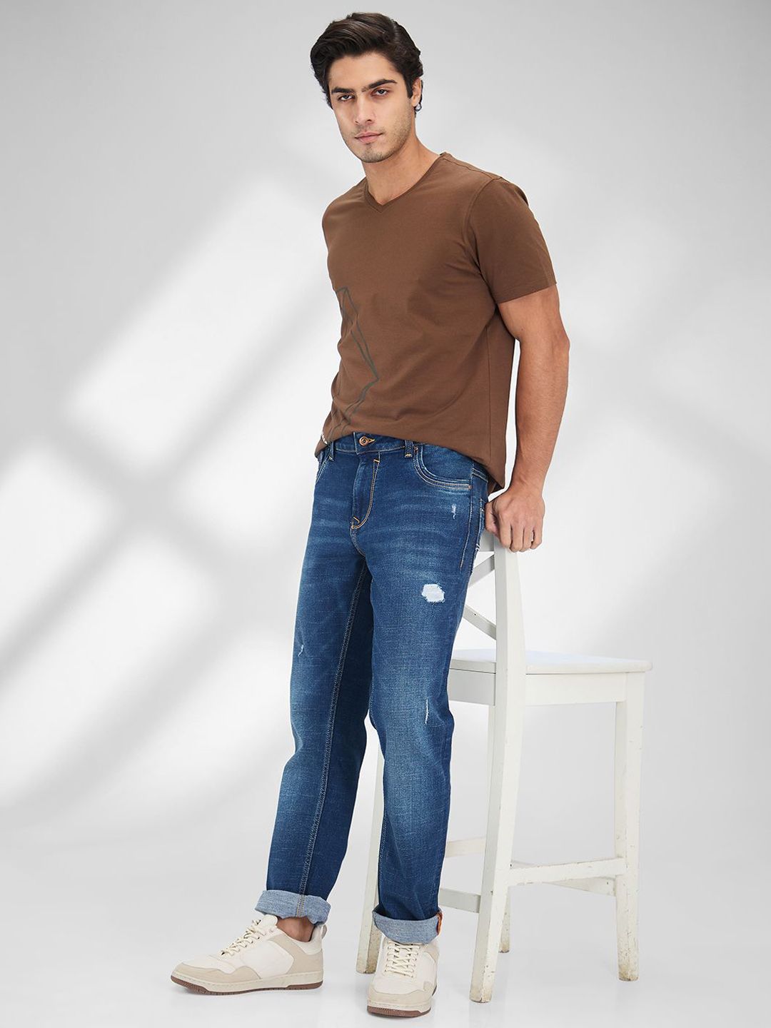SPYKAR Men Mildly Distressed Light Fade Stretchable Mid-Rise Jeans