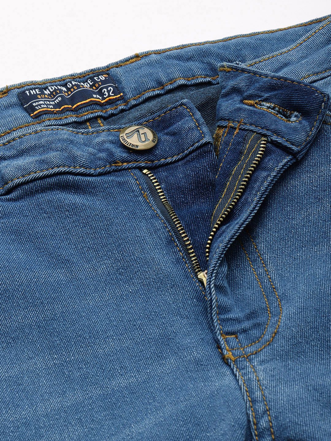 The Indian Garage Co Men Blue Bootcut Light Fade Stretchable Jeans