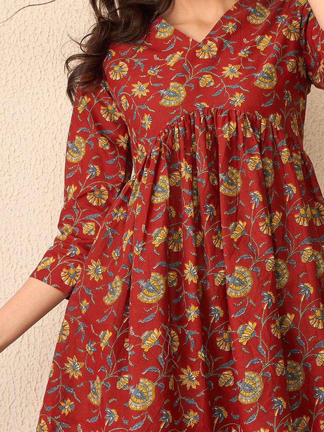 KALINI Women Floral Print Peplum V-Neck Regular Top