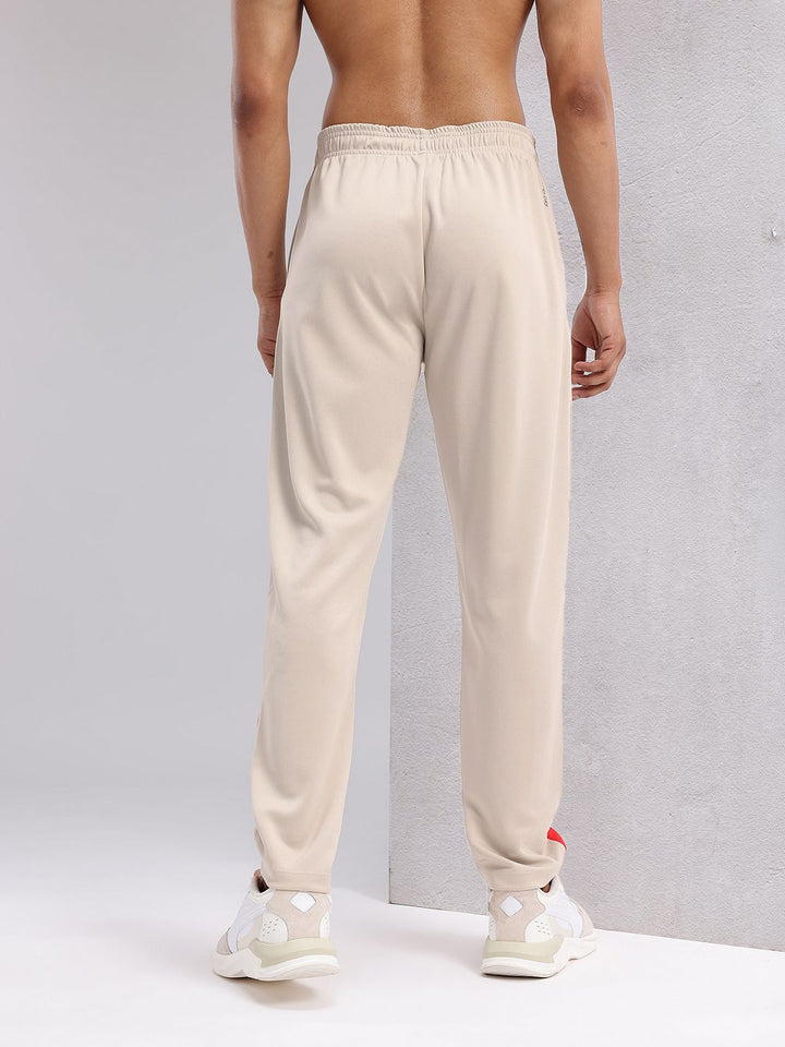 HRX by Hrithik Roshan Men Mid-Rise Rapid-Dry Running Track Pants with Side Taping Detail