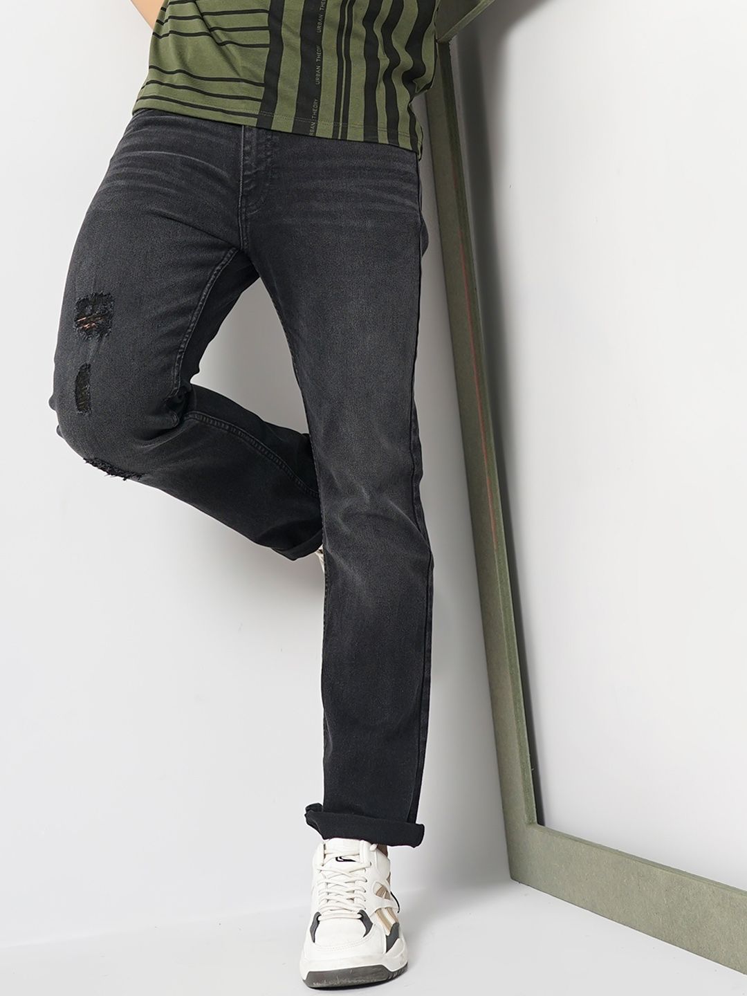 The Indian Garage Co Men Black Mid-Rise Bootcut Low Distress Heavy Fade Stretchable Jeans