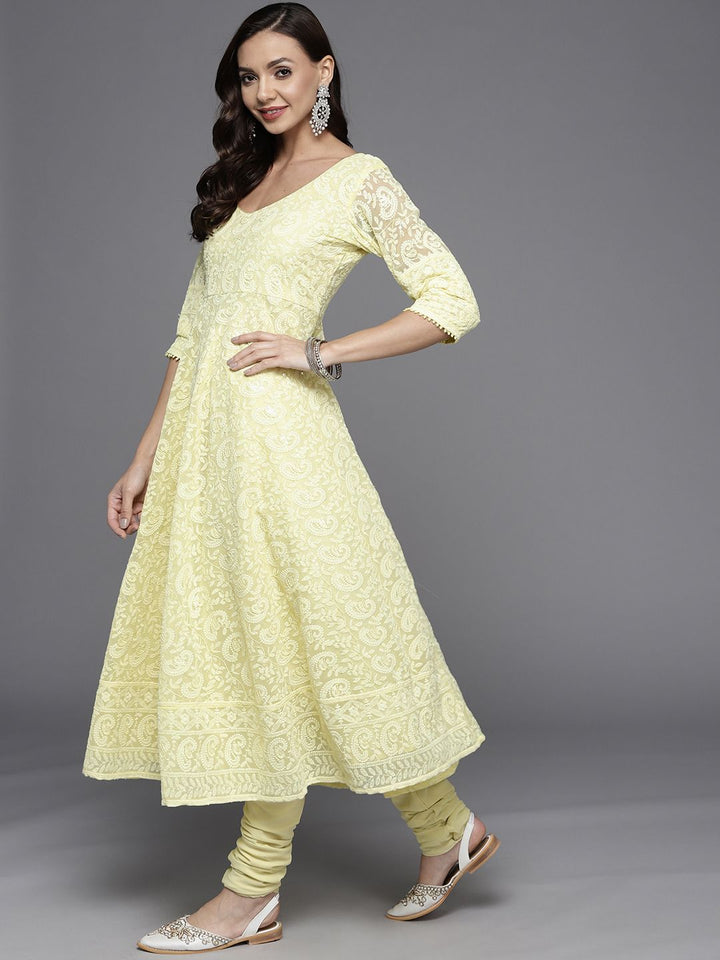Libas Women Yellow Paisley Embroidered Thread Work Kurta with Churidar & With Dupatta