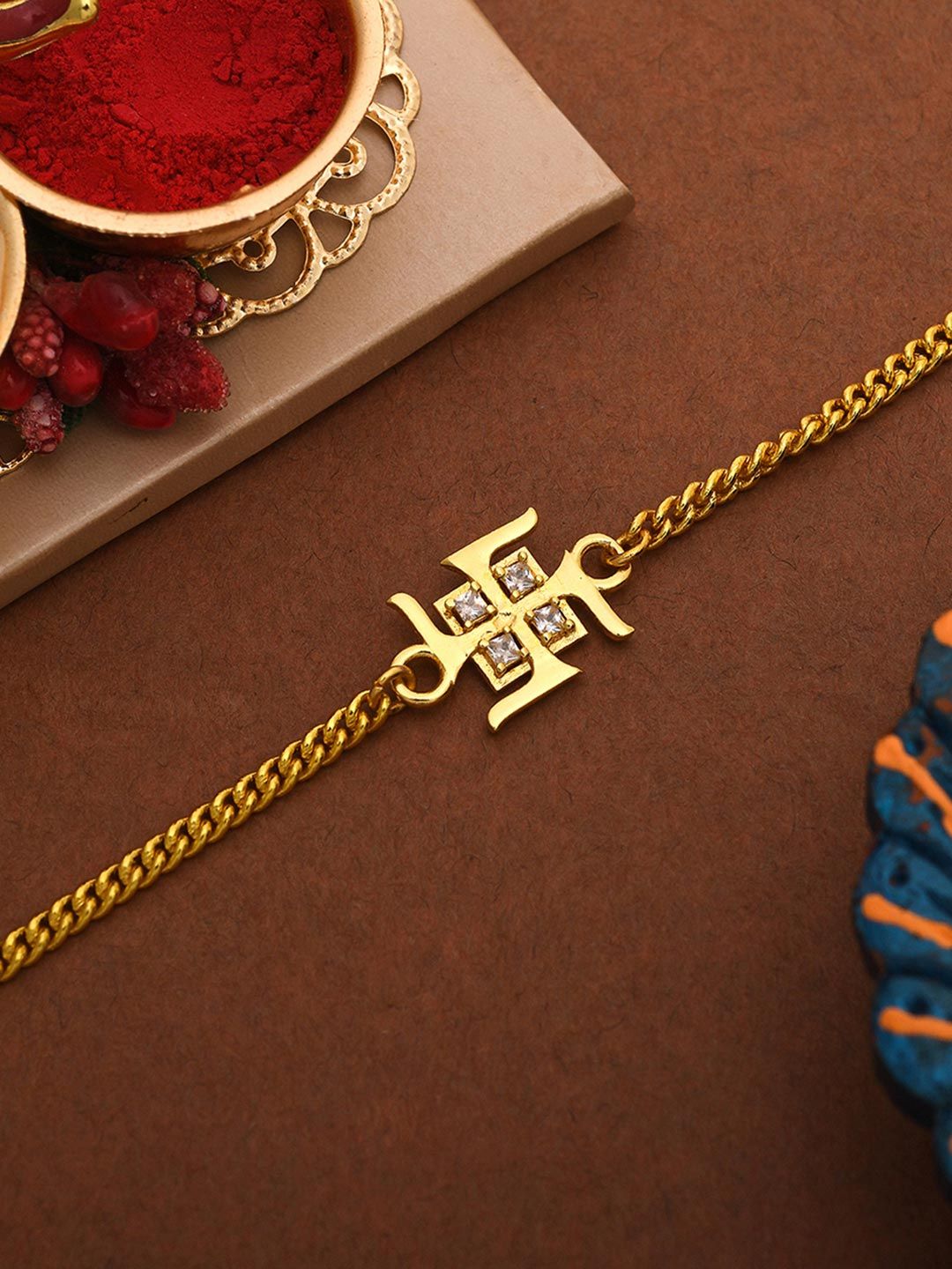 Voylla Gold Toned Auspicious Swastik Bracelet Style Rakhi
