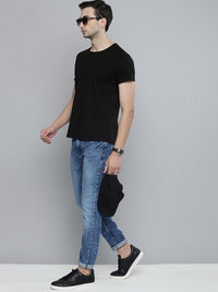 The Indian Garage Co Men Blue Slim Fit Mildly Distressed Light Fade Stretchable Jeans