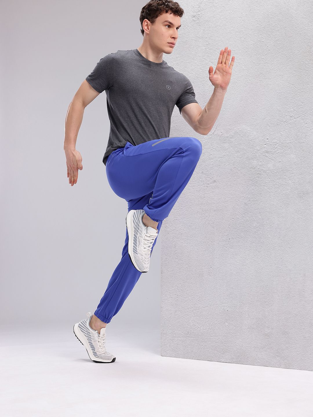 HRX by Hrithik Roshan Men Brand Logo Printed Mid-Rise Rapid-Dry Running Joggers
