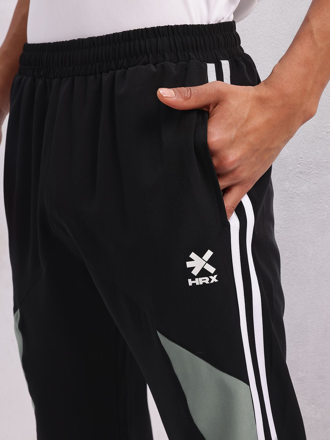 HRX by Hrithik Roshan Men Mid-Rise Colourblocked Lifestyle Track Pants with Side Stripes