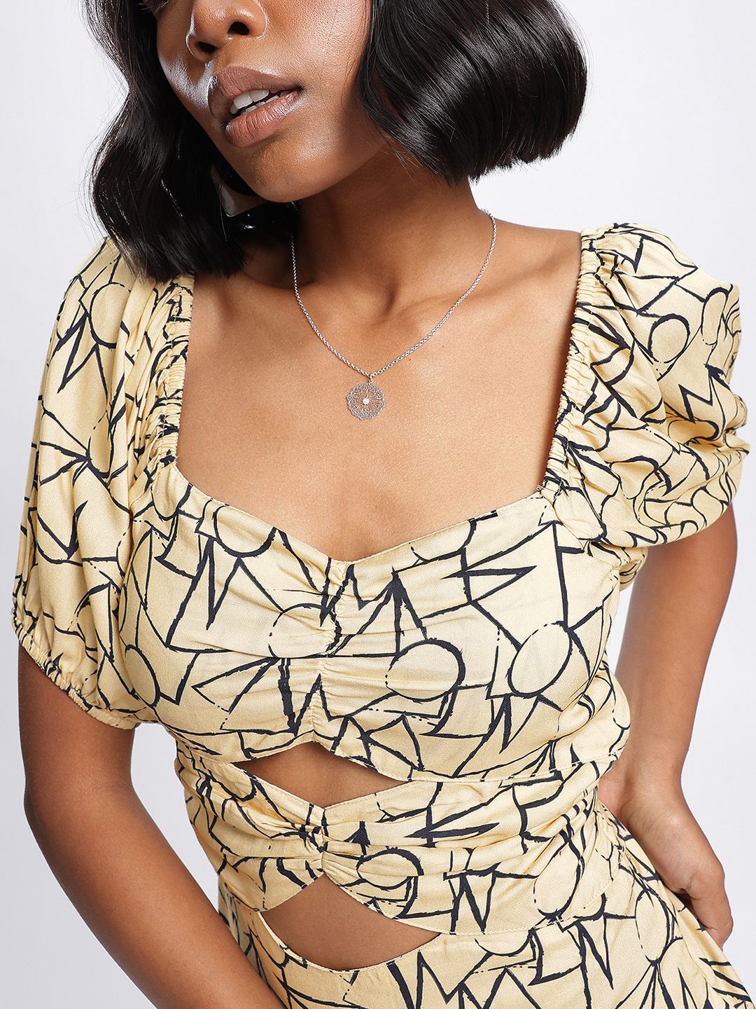 DressBerry Sensational Silhouette Printed Cut-Out Details Mini Sheath Dress