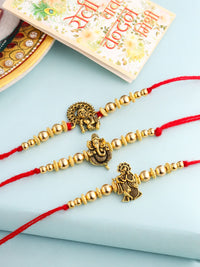 Set Uniseks NVR 3 Rakhi Benang Ganesh Ji Berton Emas dengan Roli Chawal Chandan Mishri