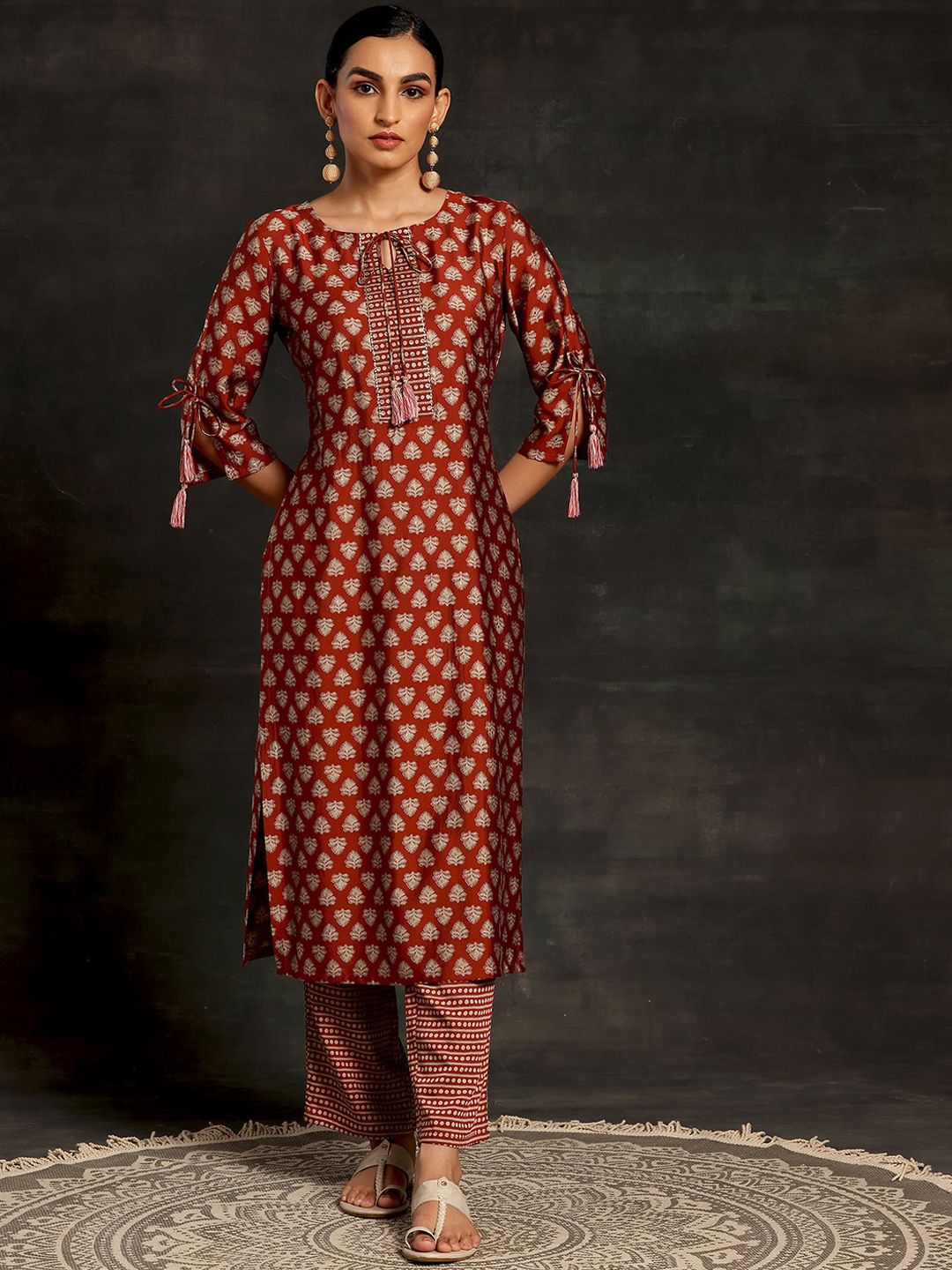 Libas Floral Printed Tie-Up Neck Three-Quarter Sleeves Sequinned Kurta with Trousers