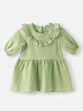 Nauti Nati Girls Green Cotton Crepe Dress with Floral Brooch