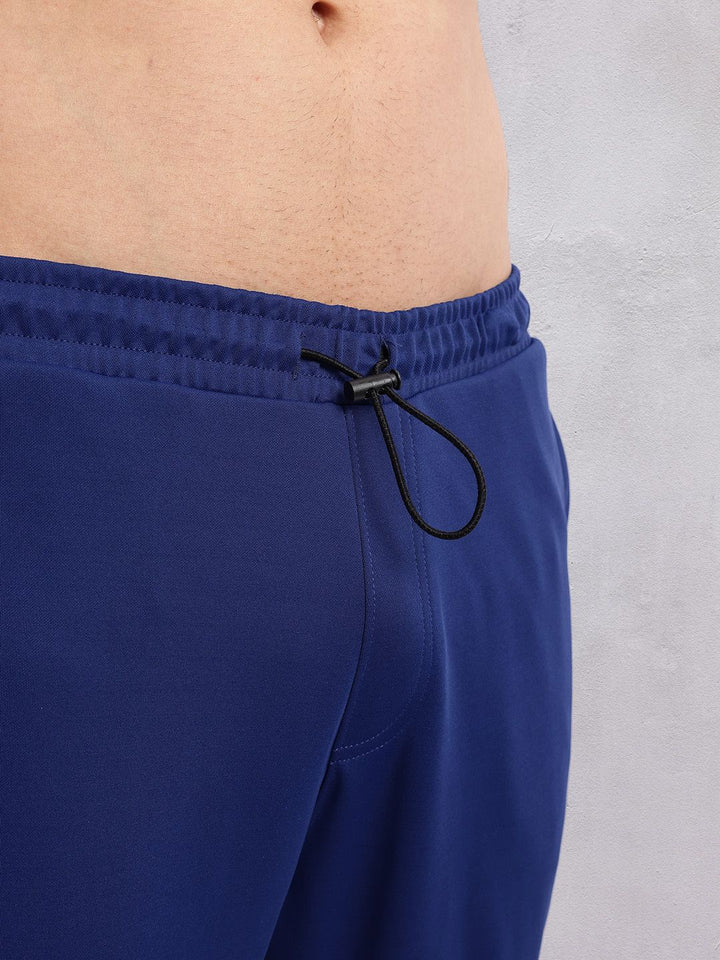 HRX by Hrithik Roshan Men Mid-Rise Rapid-Dry Running Track Pants with Reflective Elements