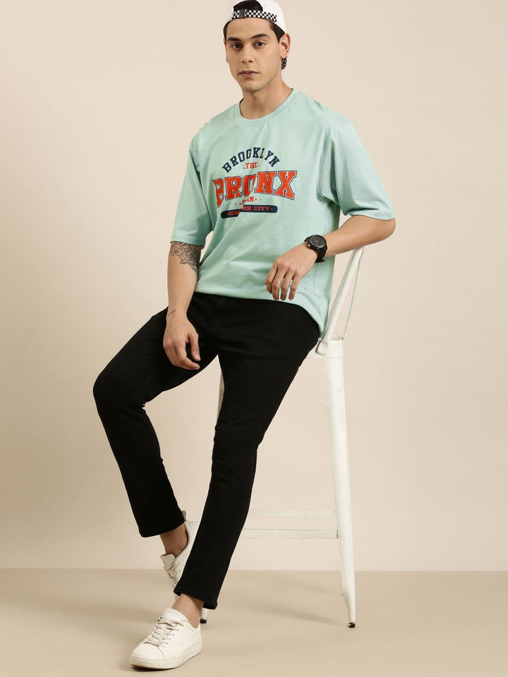 DILLINGER Men Sea Green Typography Printed Pure Cotton Oversized  T-shirt
