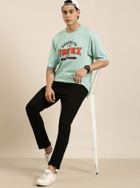 DILLINGER Men Sea Green Typography Printed Pure Cotton Oversized  T-shirt