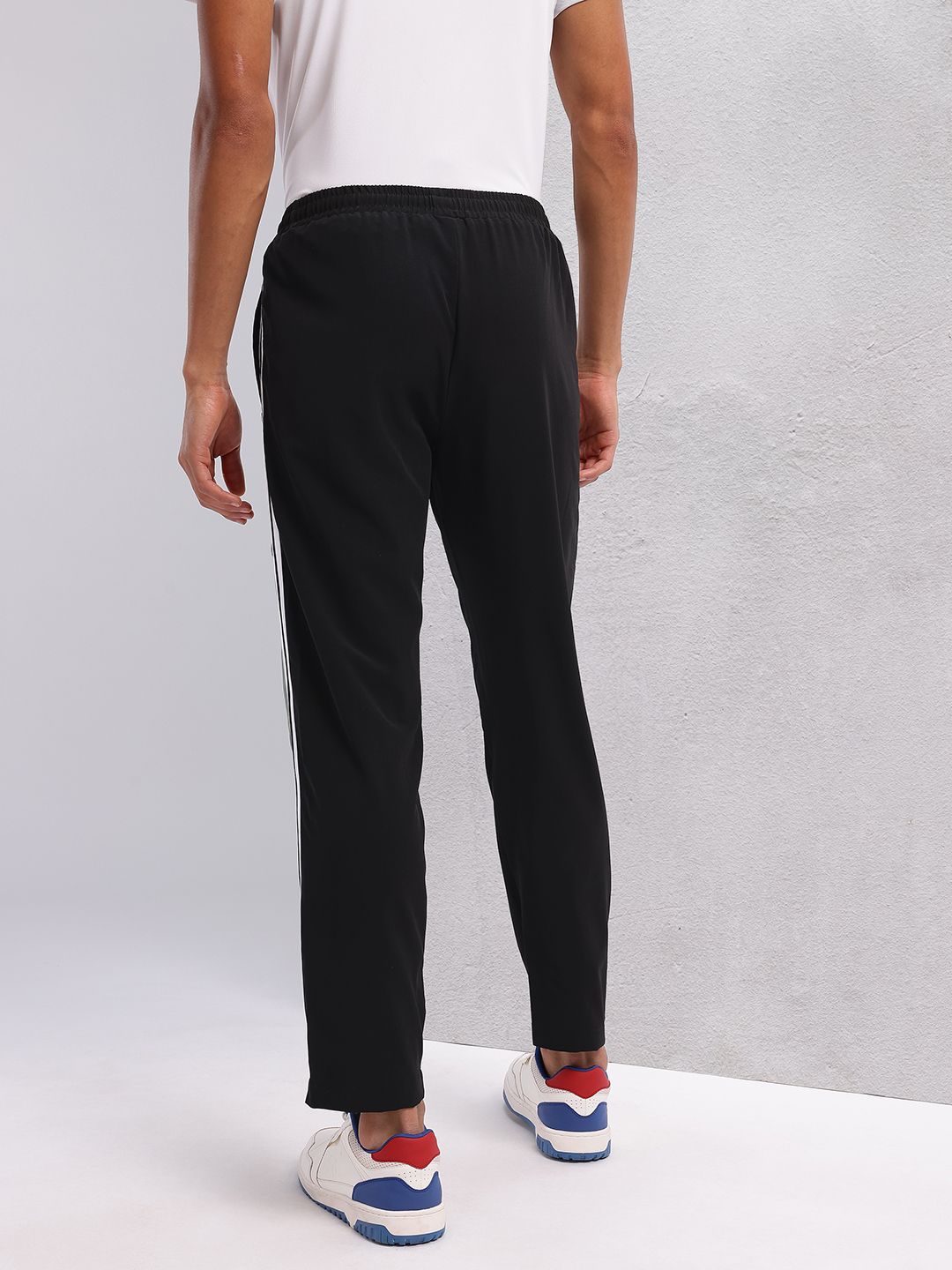 HRX by Hrithik Roshan Men Mid-Rise Colourblocked Lifestyle Track Pants with Side Stripes