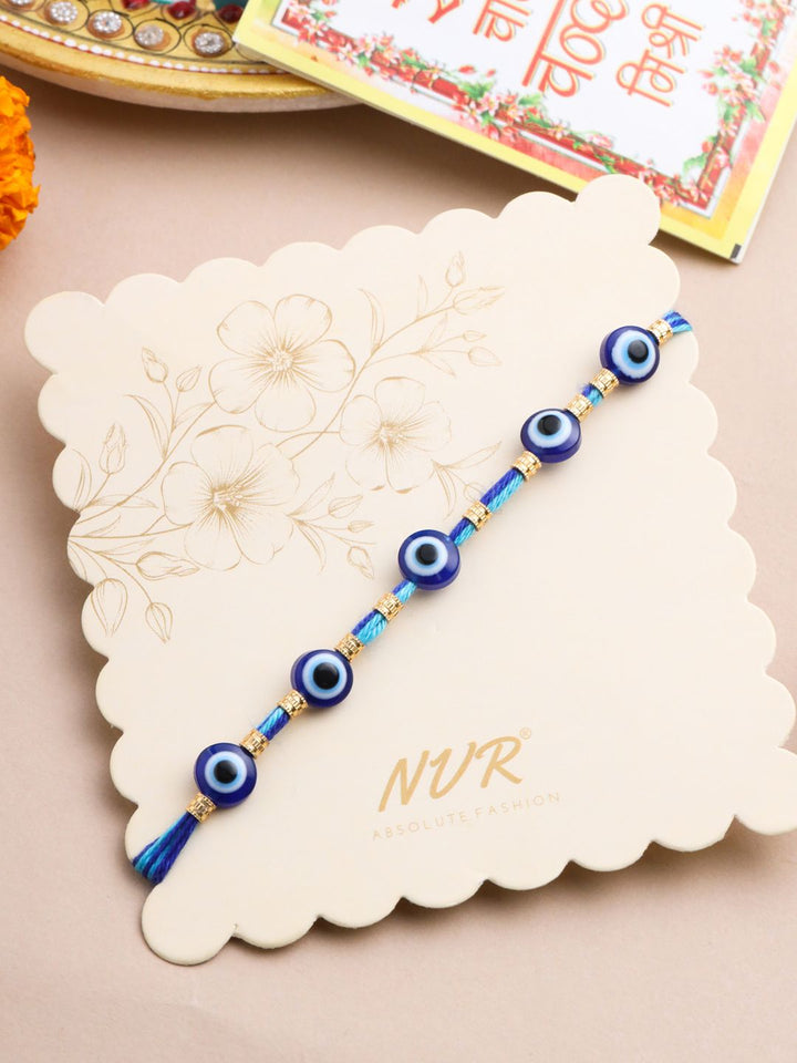 NVR Unisex Blue Evil Eye Thread Rakhi with Roli Chawal Chandan Mishri