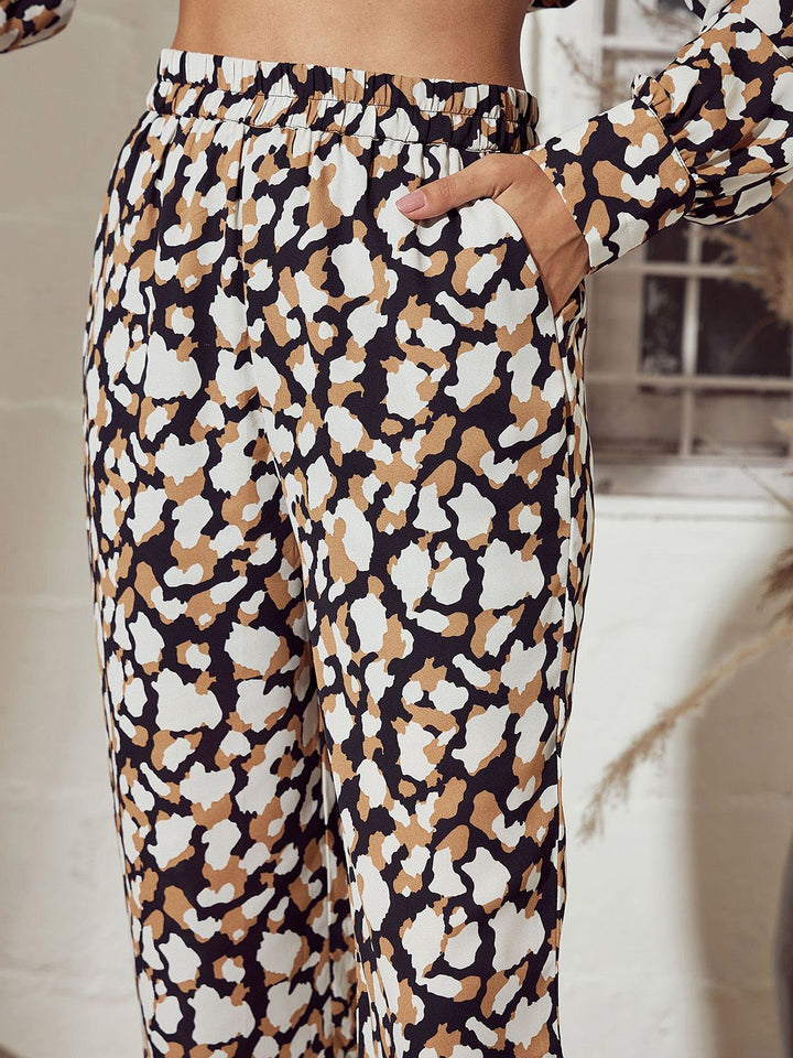 SASSAFRAS Women Beige Abstract Printed Mid-Rise Straight Trousers
