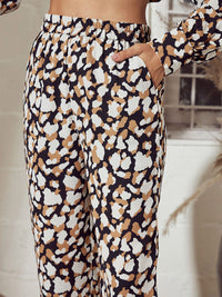 SASSAFRAS Women Beige Abstract Printed Mid-Rise Straight Trousers