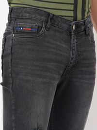 The Indian Garage Co Men Black Mid-Rise Bootcut Low Distress Heavy Fade Stretchable Jeans