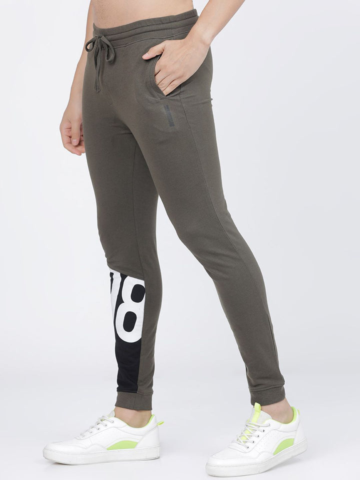 The Indian Garage Co Men Olive Green Solid Slim Fit Printed Joggers