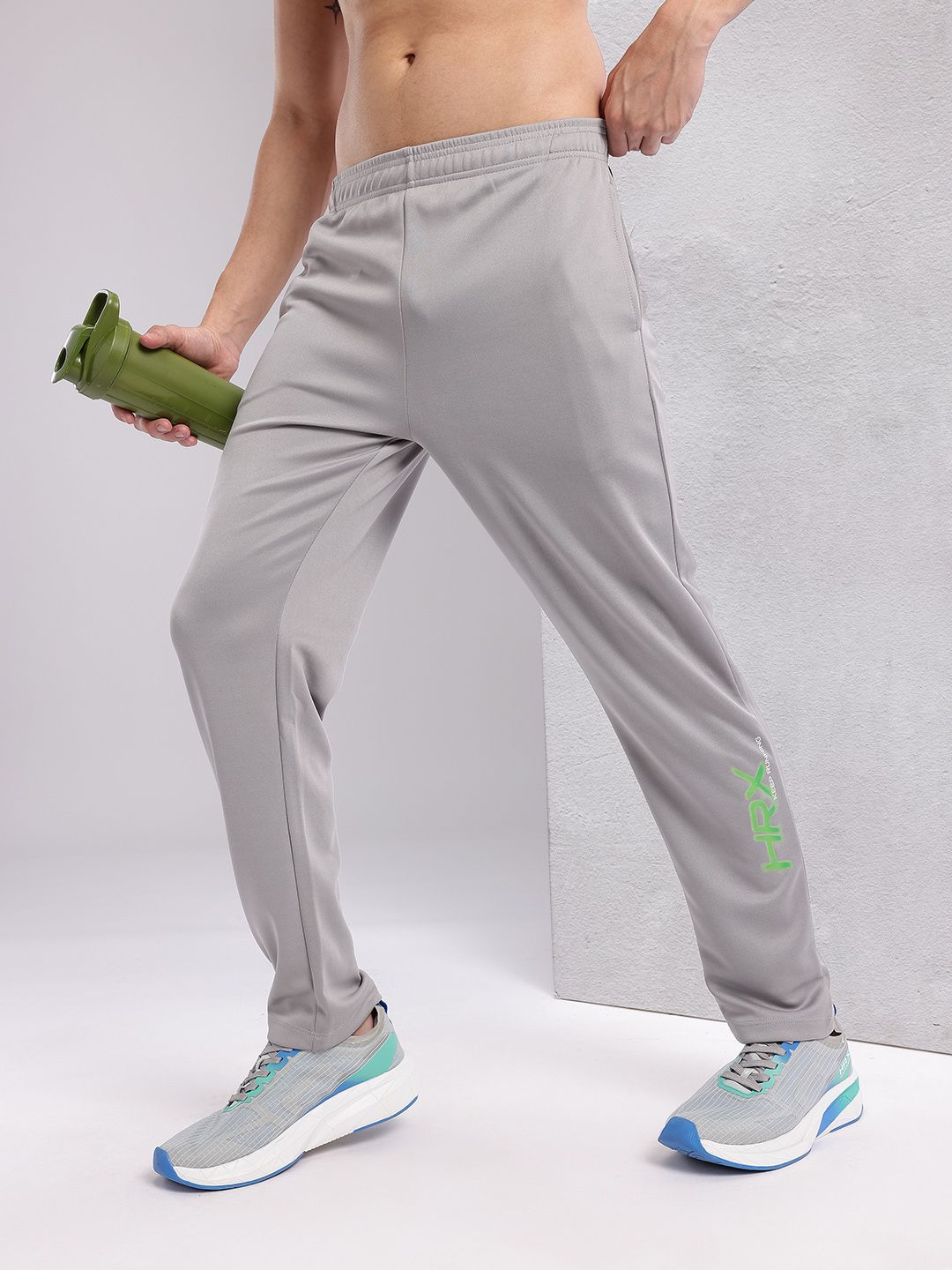 HRX by Hrithik Roshan Men Brand Logo Printed Mid-Rise Rapid-Dry Running Track Pants