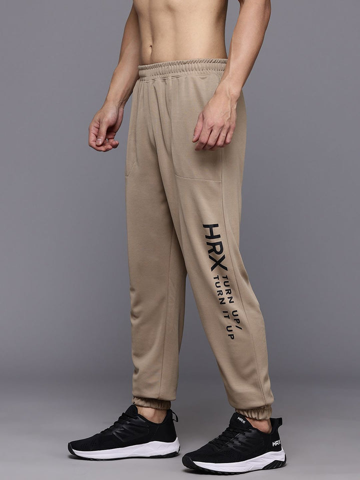 HRX by Hrithik Roshan Men Brand Logo Printed Mid-Rise Regular Fit Training Joggers