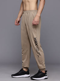 HRX by Hrithik Roshan Men Brand Logo Printed Mid-Rise Regular Fit Training Joggers